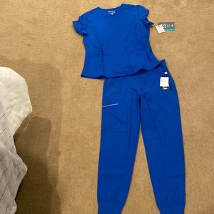 ROYAL BLUE SCRUBS SET FOR SALE. Never worn